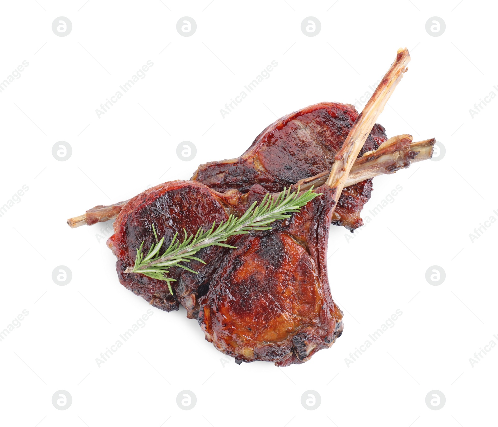 Photo of Pieces of delicious grilled beef meat and rosemary isolated on white, top view