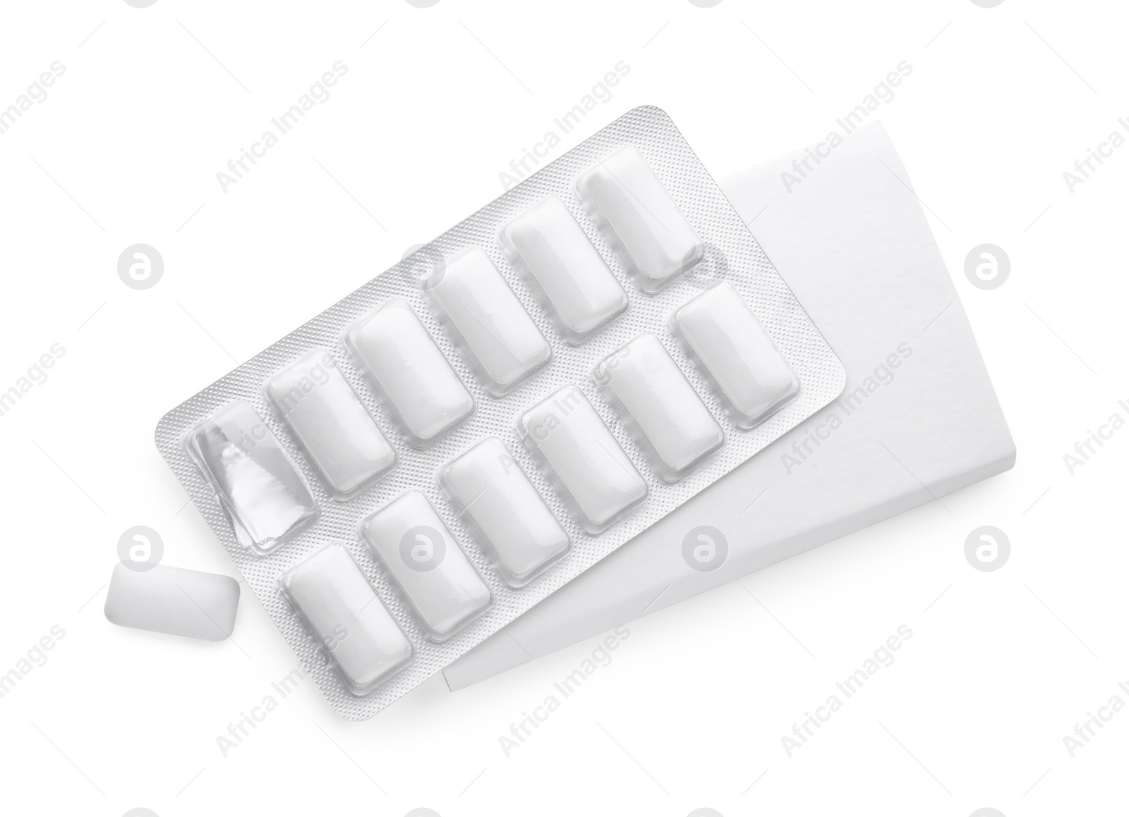 Photo of Blister with chewing gums on white background, top view