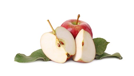 Photo of Whole, cut red apples and leaves isolated on white