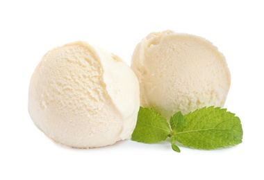 Cold delicious ice cream balls with mint on white background