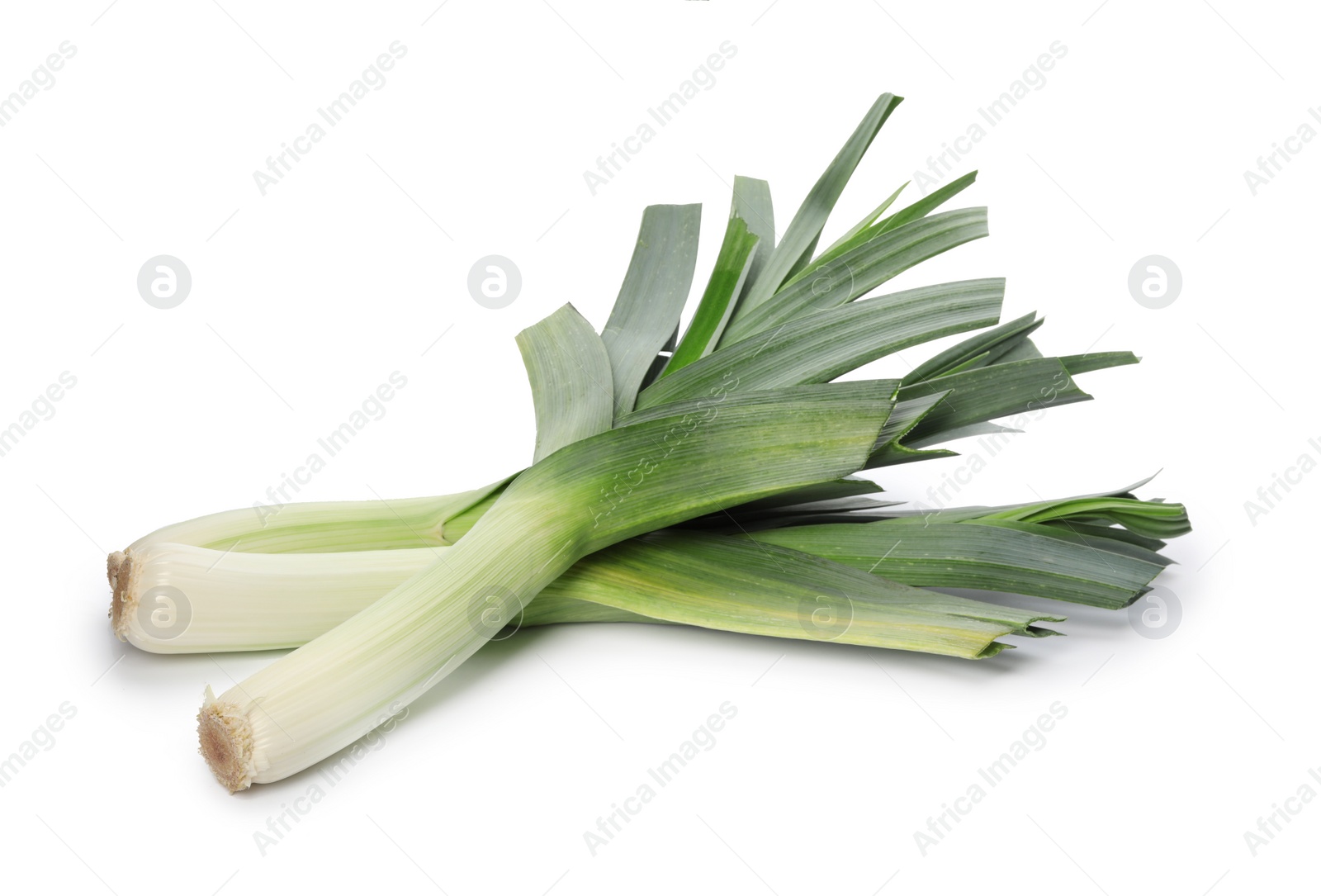 Photo of Fresh raw leeks on white background. Ripe onion