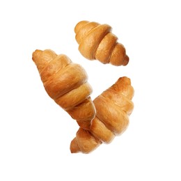 Image of Crusty golden croissants falling on white background