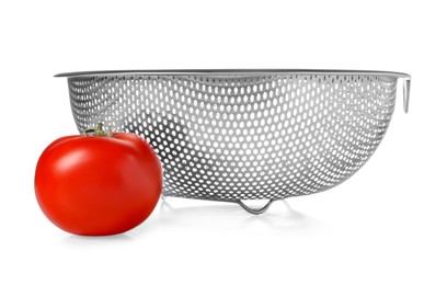 Photo of Colander with fresh tomato isolated on white