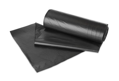 Photo of Roll of black garbage bags isolated on white