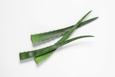 Fresh aloe vera leaves on white background, flat lay