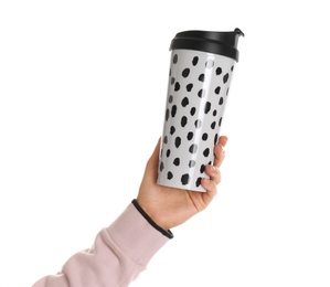 Photo of Woman holding elegant thermocup on white background, closeup