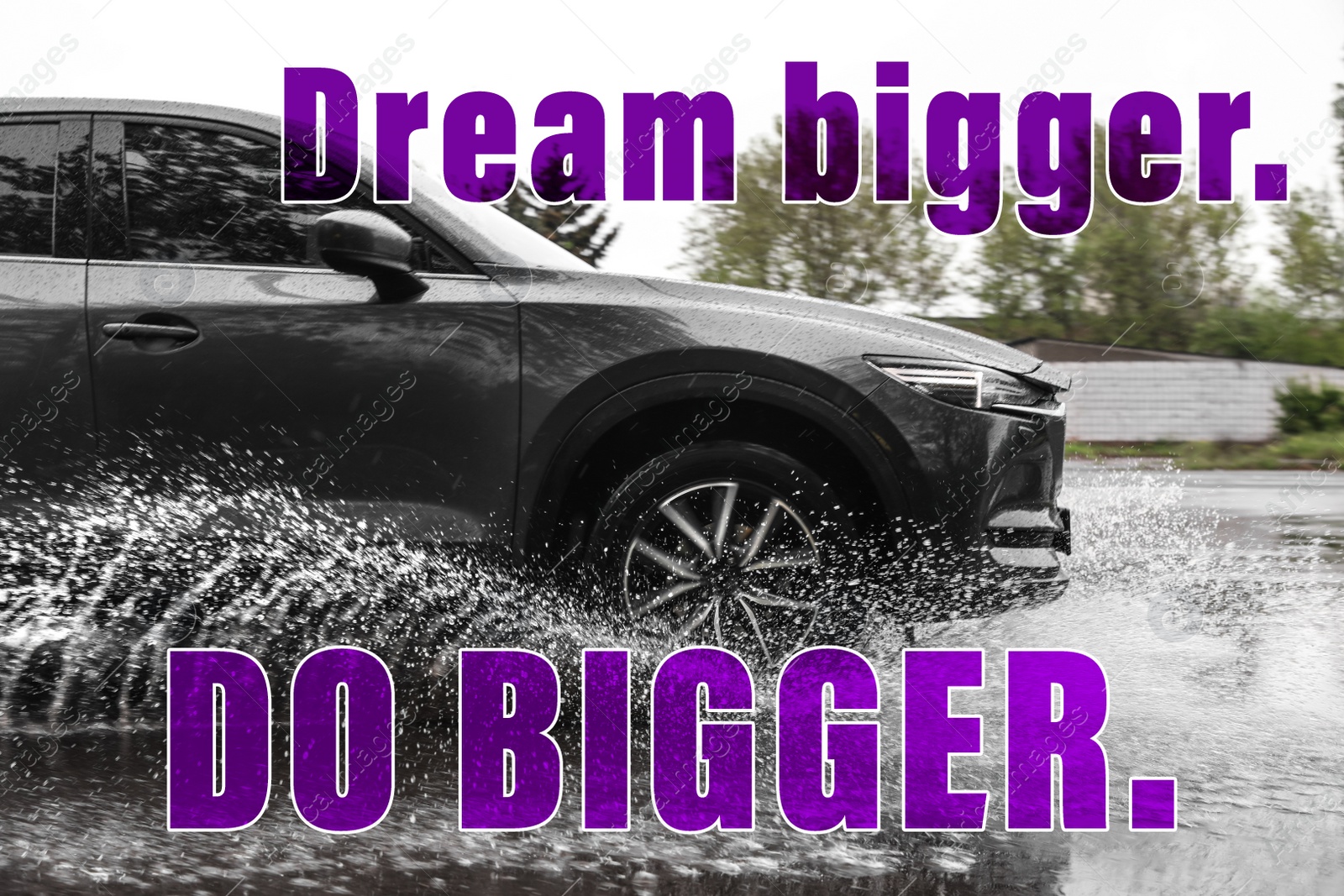 Image of Dream Bigger Do Bigger. Inspirational quote motivating to set life goals freely and forget about reasons that can hold back. Text against luxury car outdoors