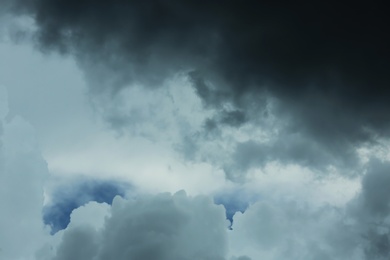 Sky with heavy rainy clouds on grey day