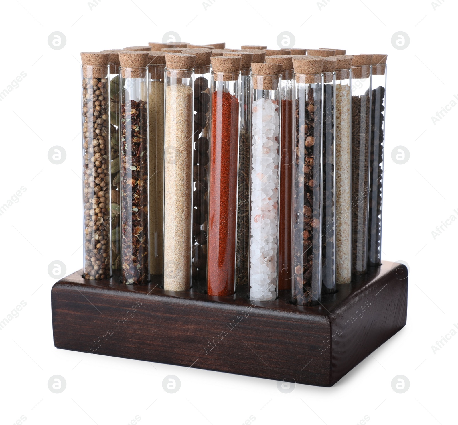 Photo of Glass tubes with different spices in rack on white background