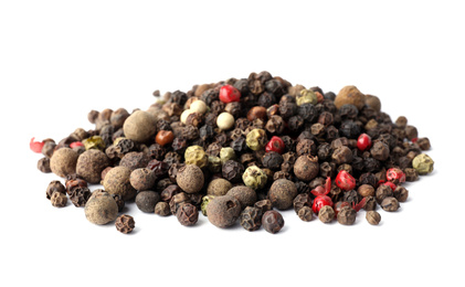 Photo of Mix of different pepper grains isolated on white