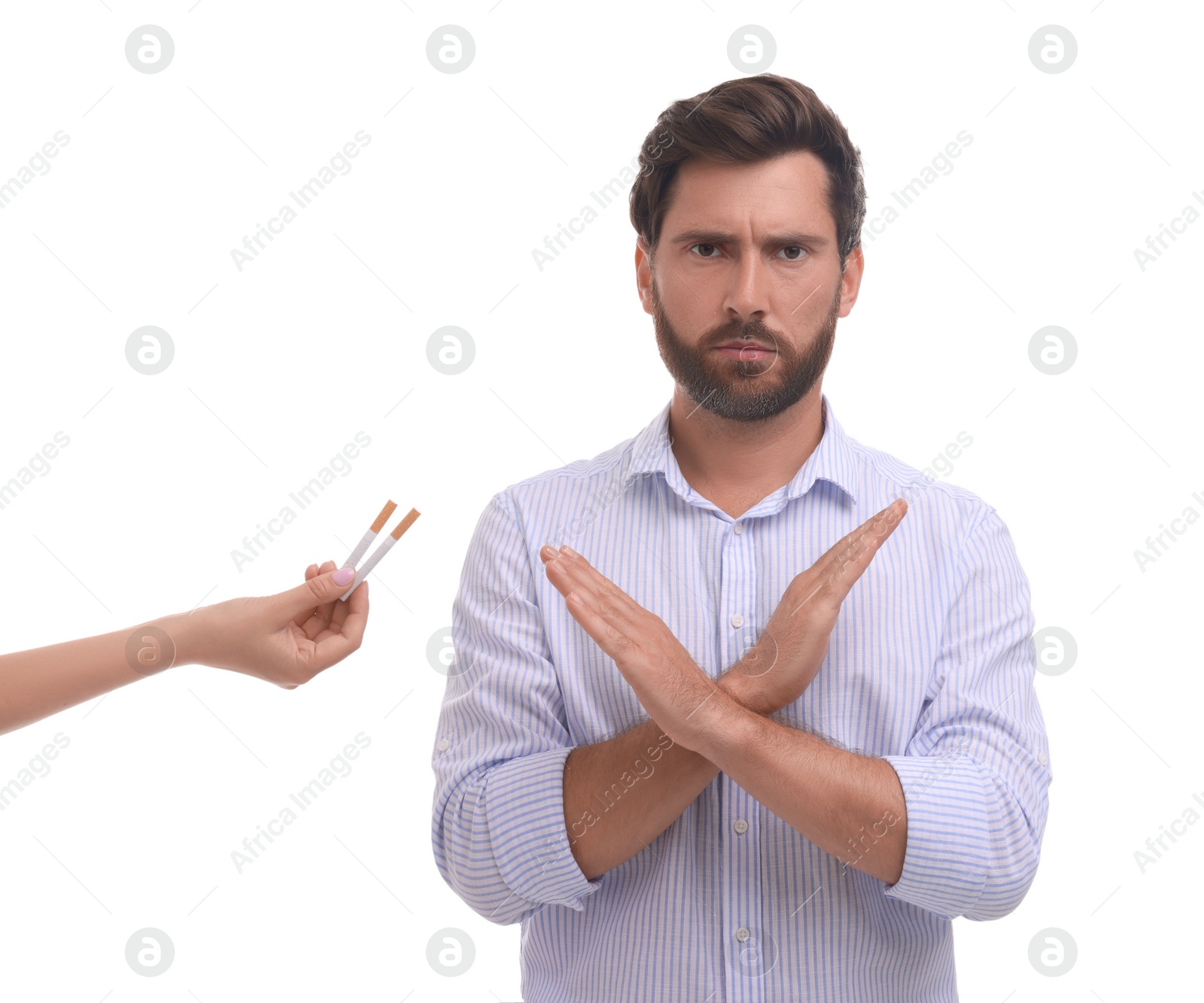 Photo of Stop smoking concept. Man refusing cigarettes on white background