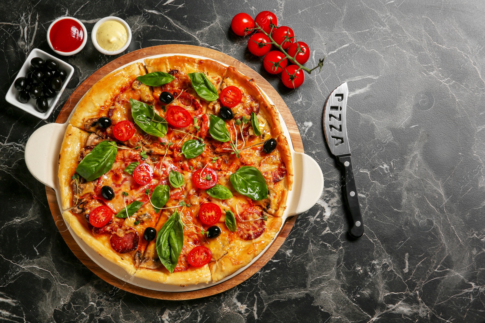 Photo of Flat lay composition with tasty homemade pizza on table