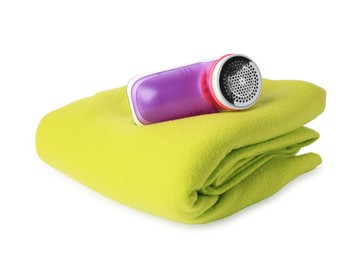 Photo of Fabric shaver and woolen cloth with lint on white background