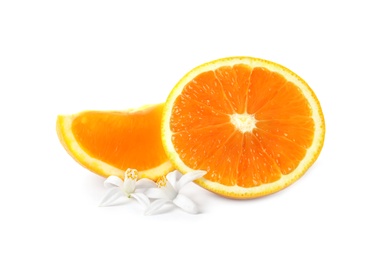 Orange slices and flowers on white background. Citrus fruit