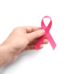 Woman holding pink ribbon on white background. Cancer awareness