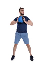 Photo of Athletic man doing exercise with medicine ball isolated on white