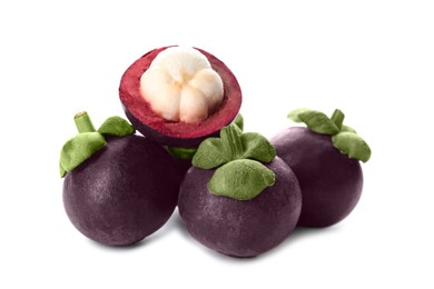 Photo of Fresh ripe mangosteen fruits on white background