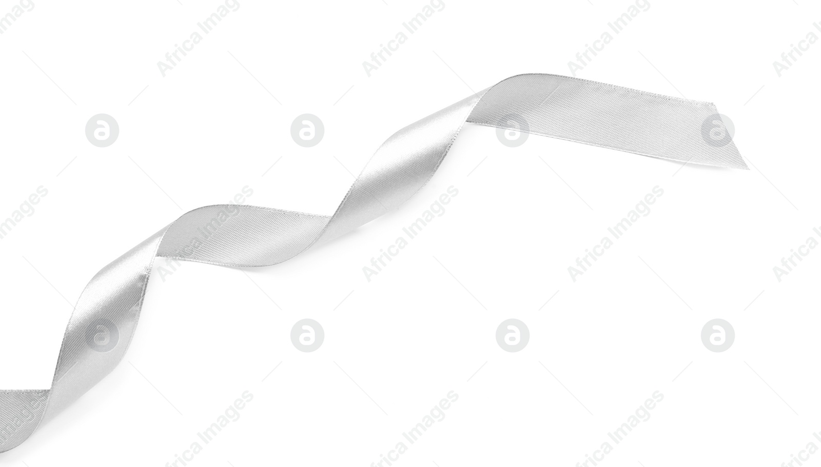 Photo of Beautiful silver ribbon isolated on white, top view