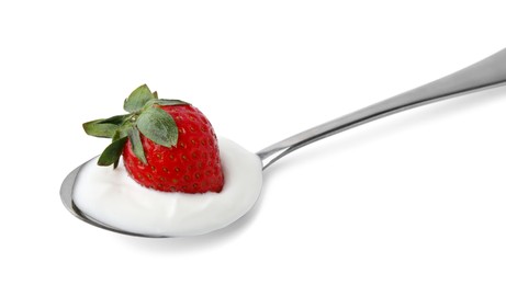 Photo of Spoon with yogurt and strawberry isolated on white