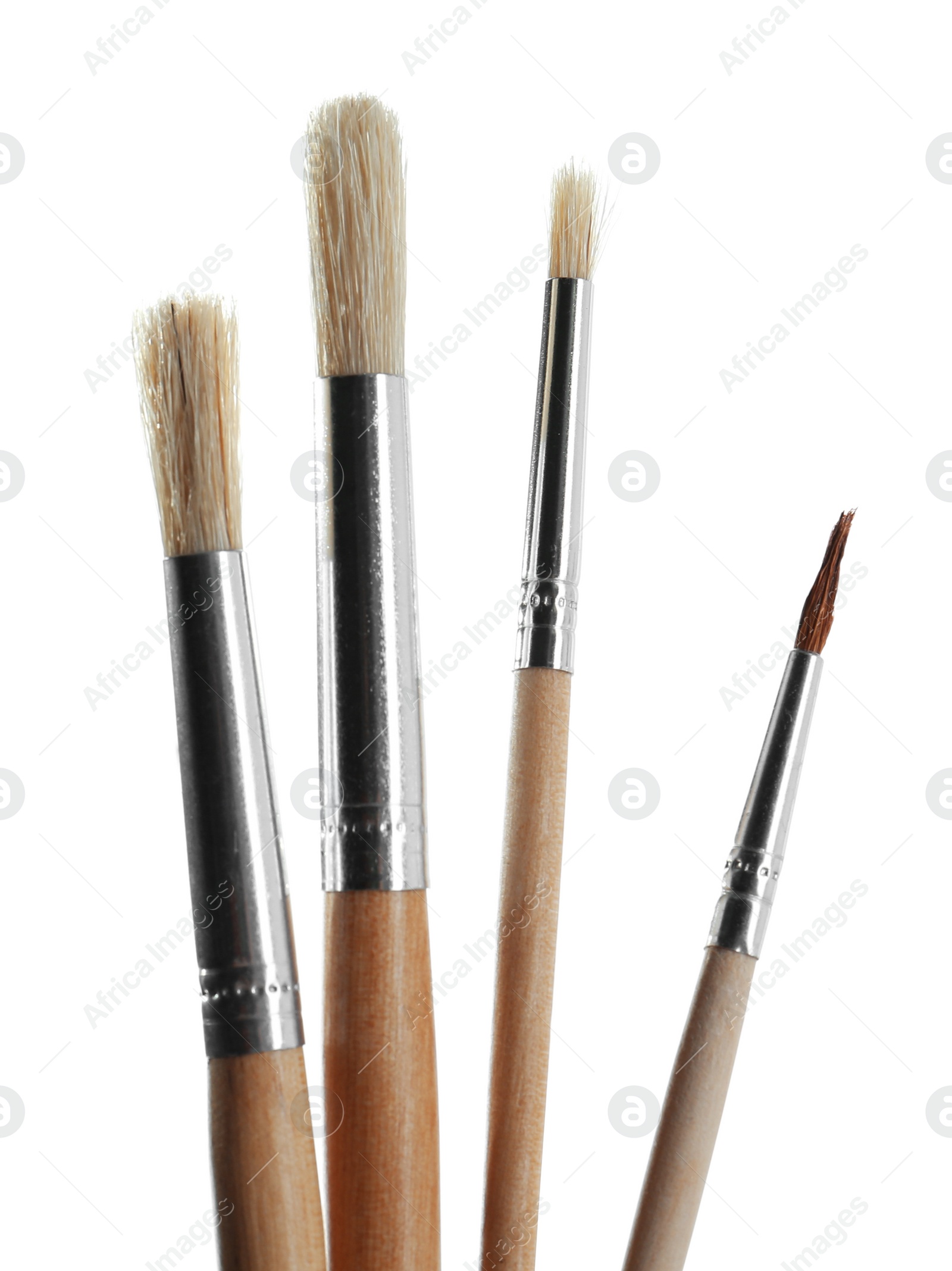 Photo of Set of different paint brushes on white background