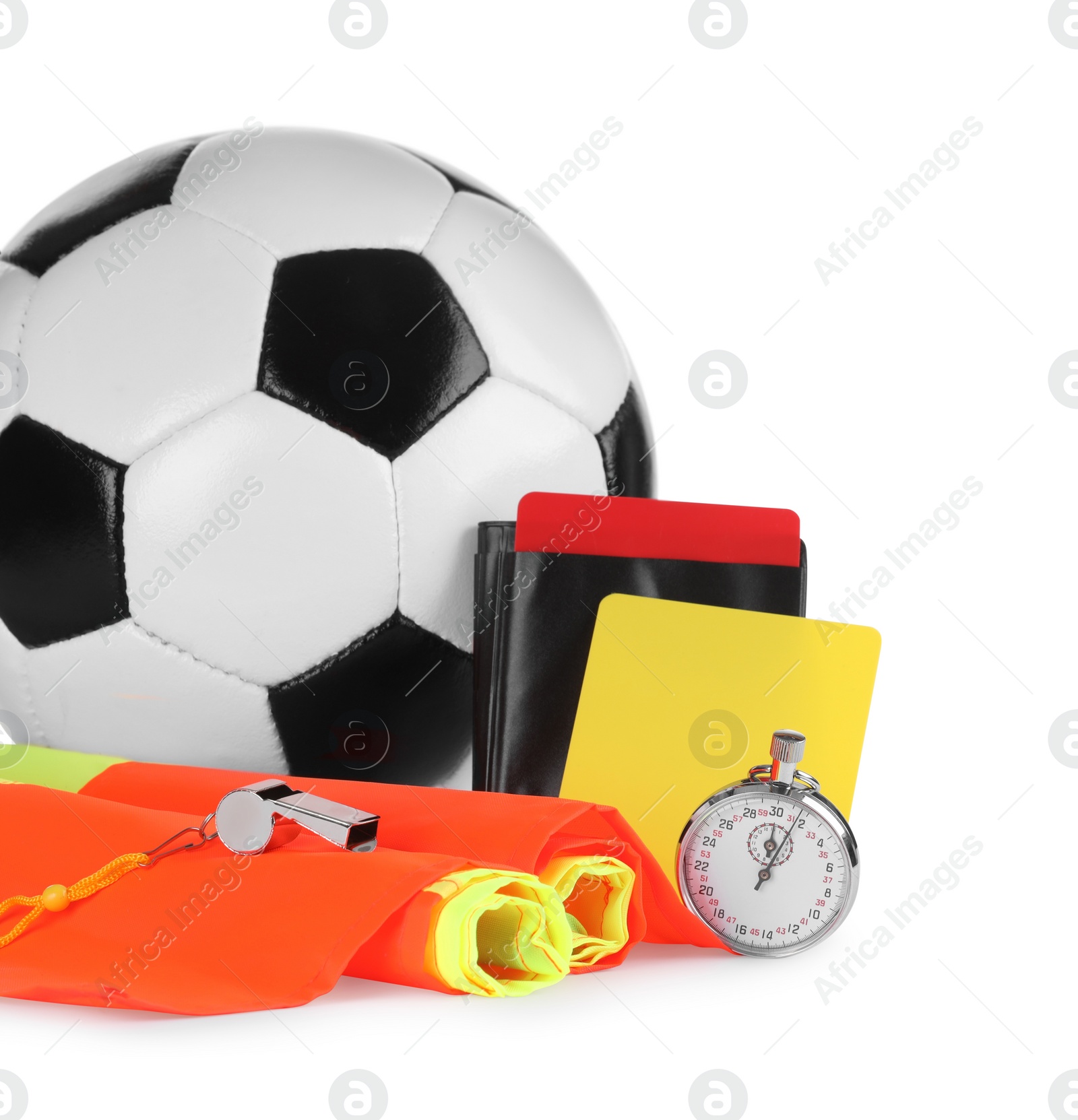 Photo of Football referee equipment. Soccer ball, flags, stopwatch, cards and whistle isolated on white