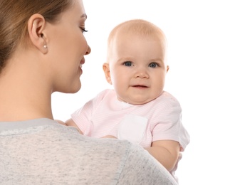 Photo of Young mother with her baby isolated on white