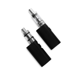 Photo of Electronic cigarettes on white background, top view