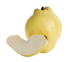 Photo of Whole and cut delicious quinces on white background