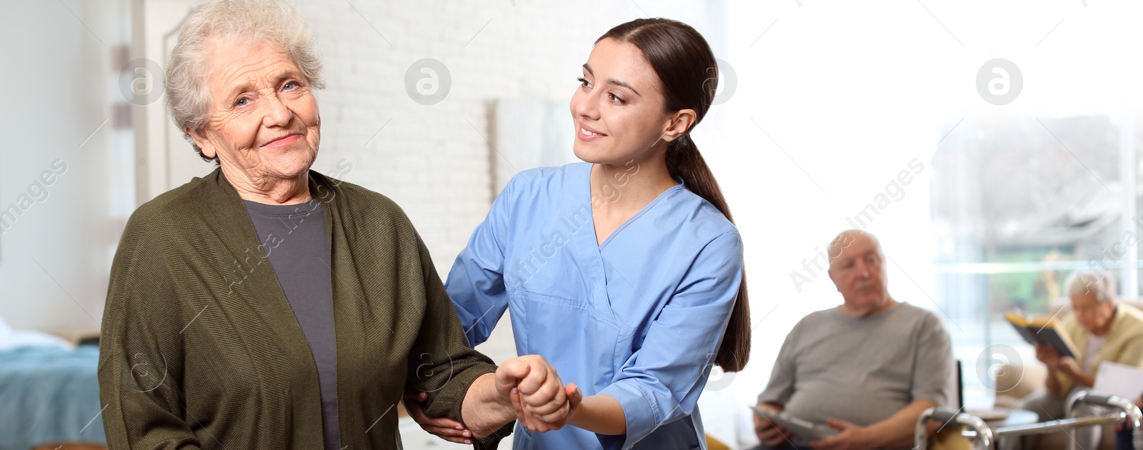 Image of Nurse taking care of elderly woman in geriatric hospice. Banner design