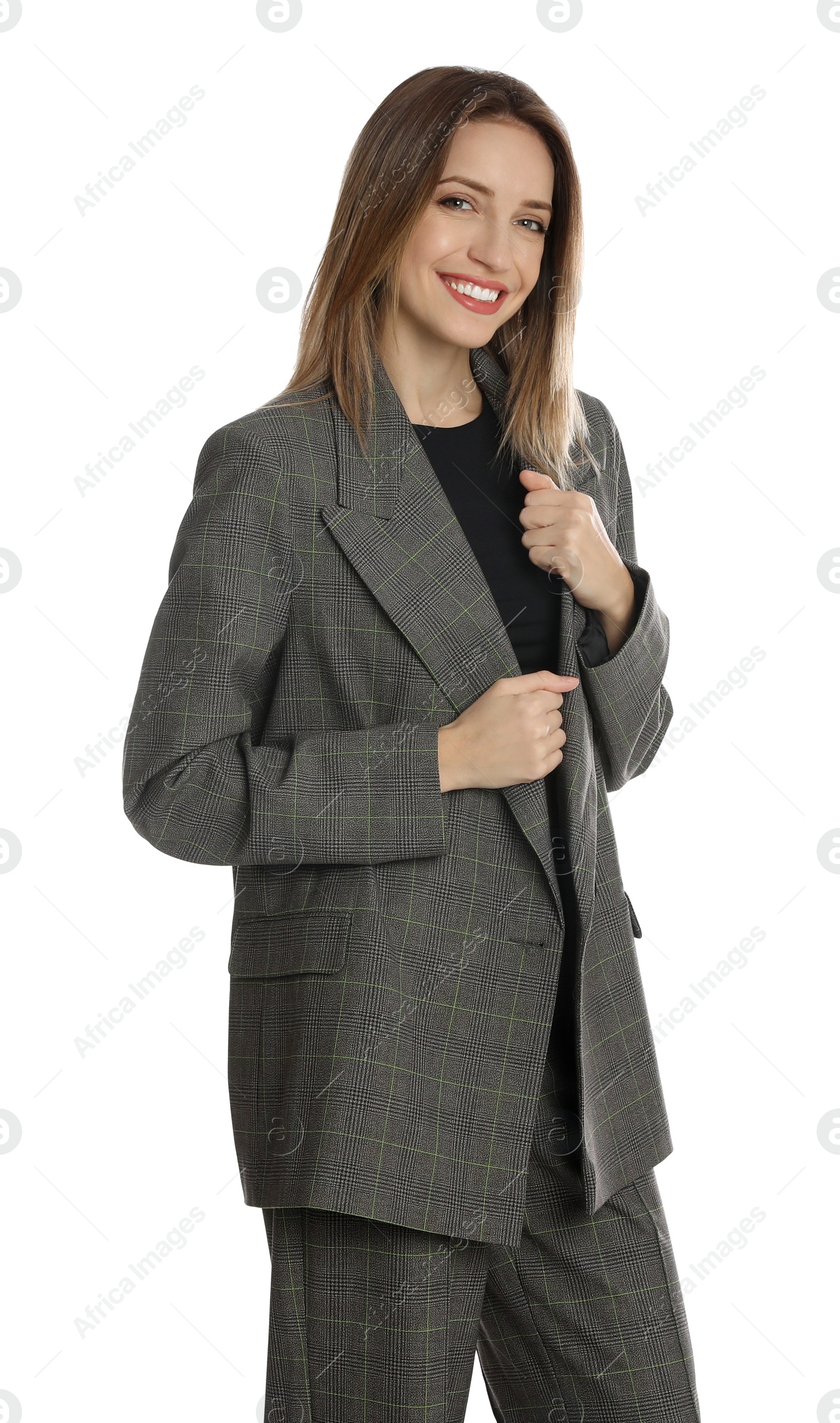 Photo of Portrait of beautiful young woman in fashionable suit on white background. Business attire