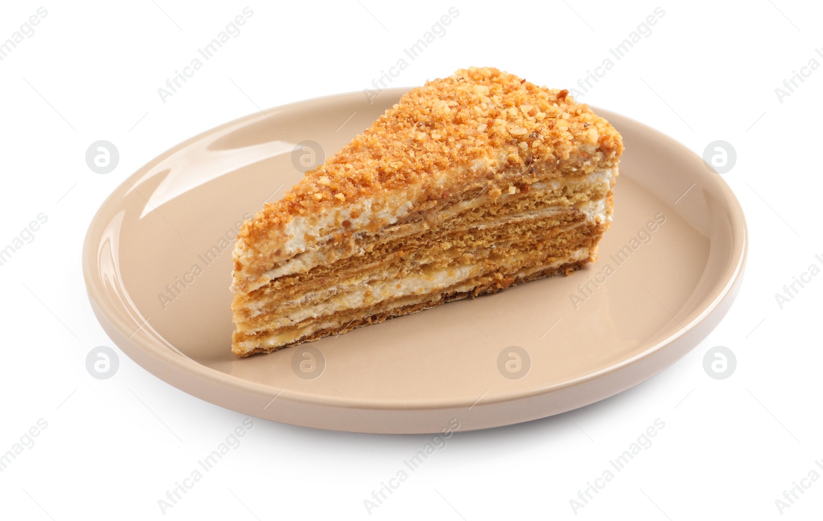 Photo of Slice of delicious honey cake isolated on white