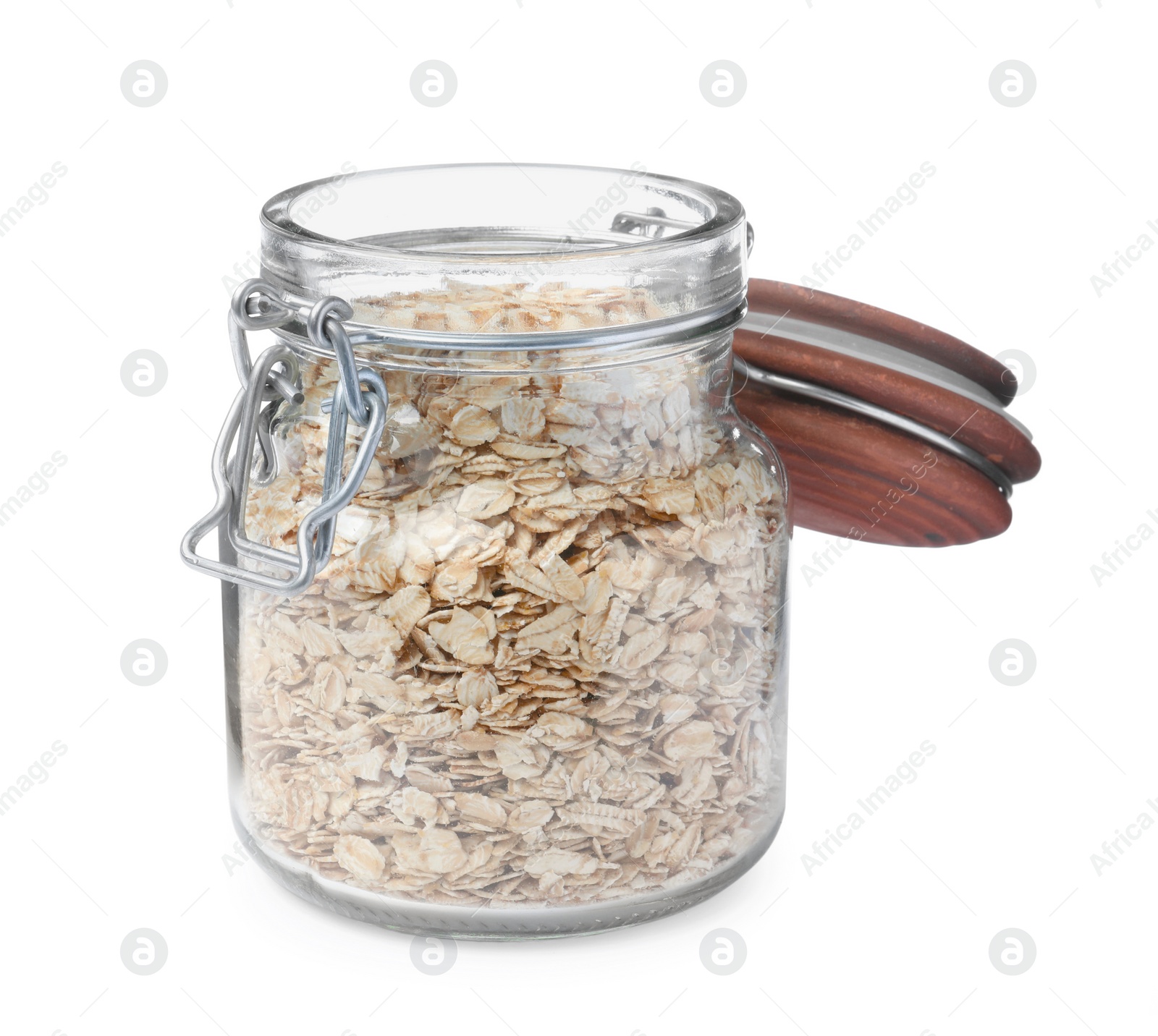 Photo of Raw oatmeal in glass jar isolated on white