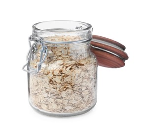 Photo of Raw oatmeal in glass jar isolated on white