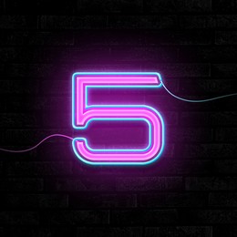 Image of Glowing neon number 5 sign on brick wall