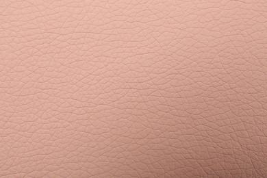 Photo of Beautiful pink leather as background, top view