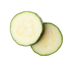 Slices of ripe zucchini on white background, top view