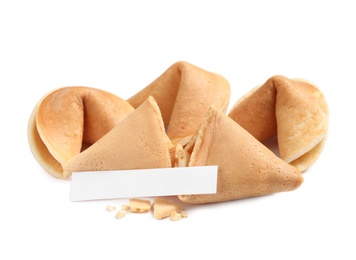 Photo of Traditional fortune cookies with prediction on white background