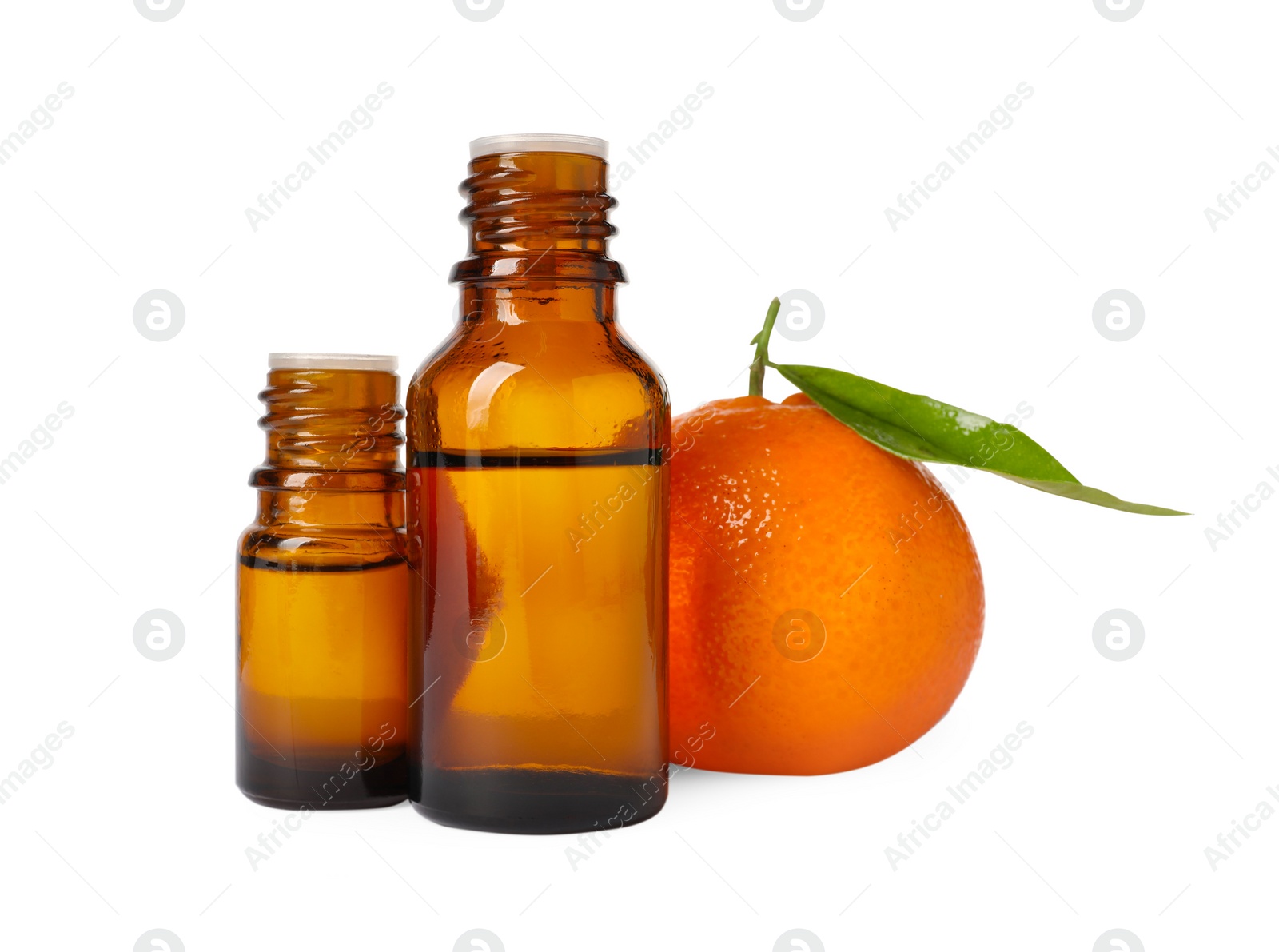 Photo of Aromatic tangerine essential oil in bottles and citrus fruit isolated on white