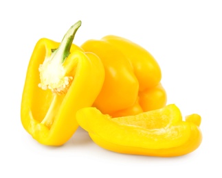 Photo of Whole and cut yellow bell peppers isolated on white