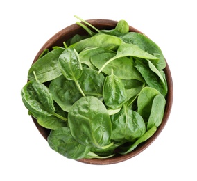 Photo of Fresh green healthy baby spinach leaves in wooden plate isolated on white, top view