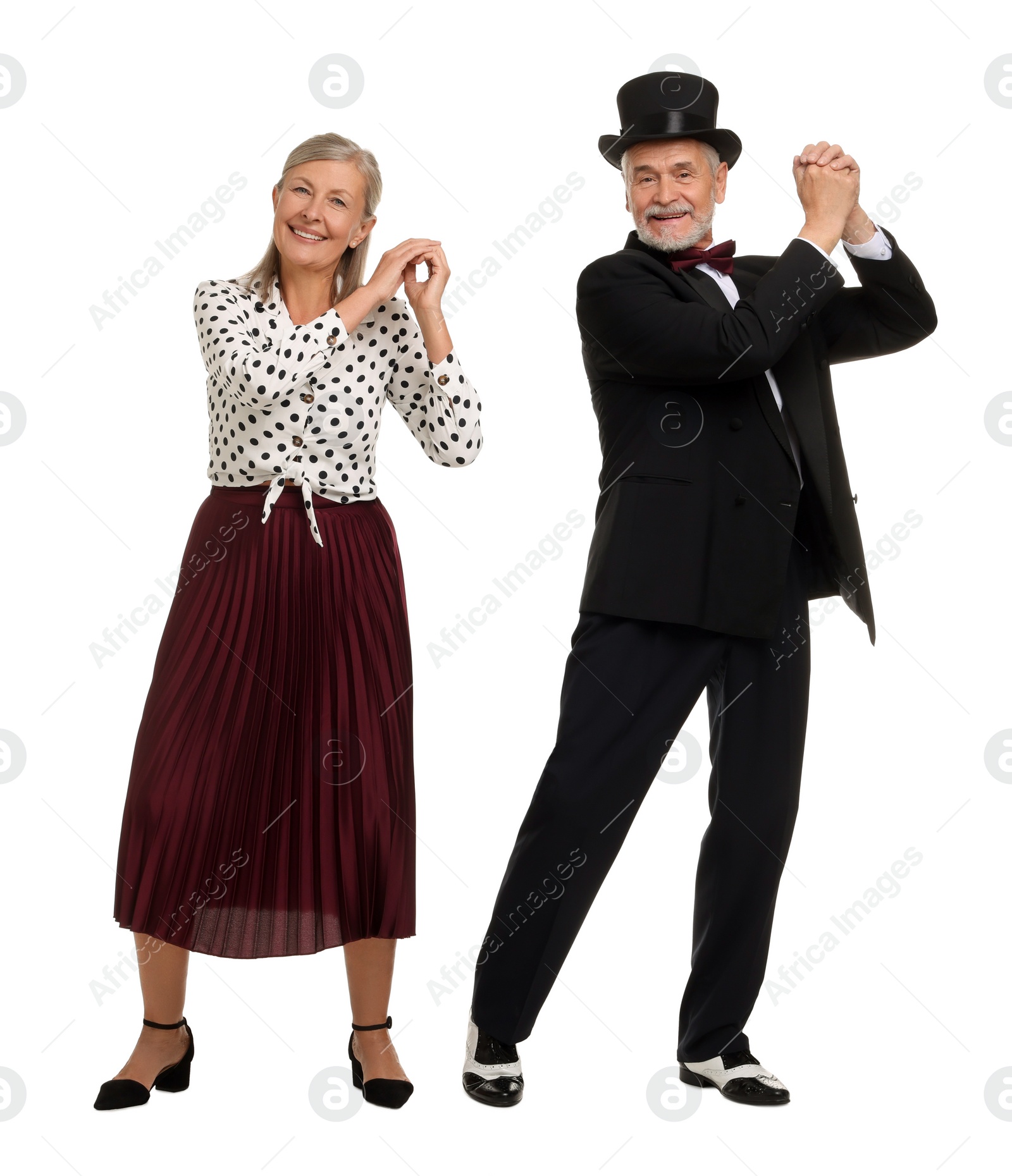 Photo of Senior couple dancing together on white background