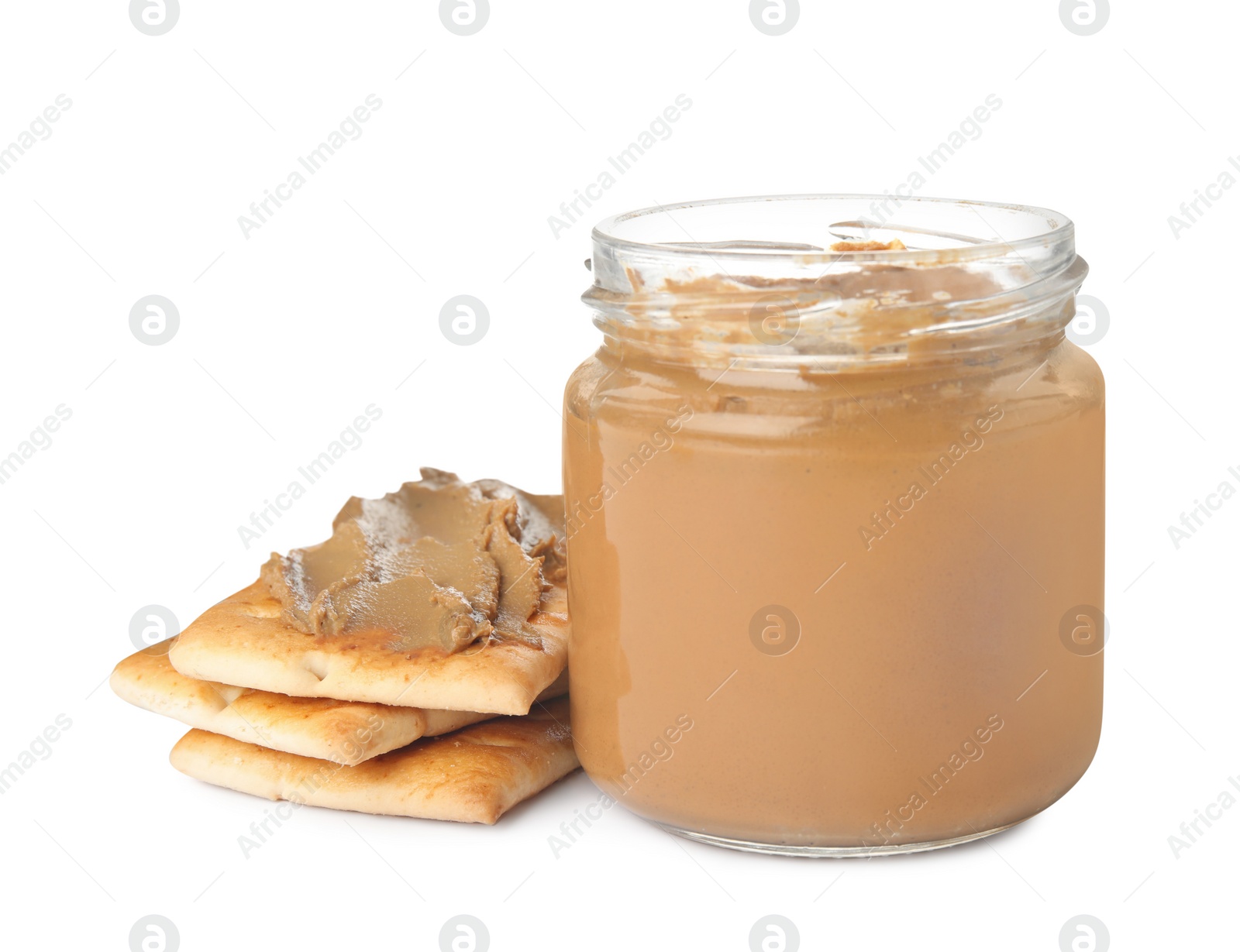 Photo of Crispy crackers and delicious meat pate on white background