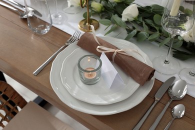 Photo of Festive table setting with beautiful tableware and decor