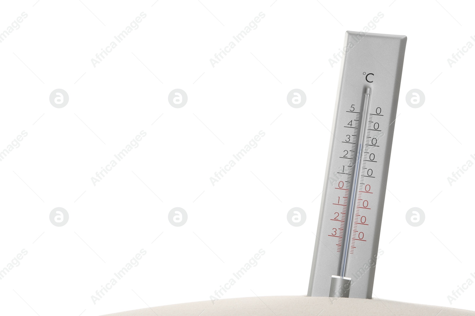 Photo of Weather thermometer in sand against white background