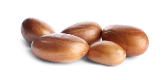 Photo of Many raw jackfruit seeds on white background