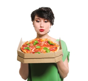 Attractive young woman with delicious pizza on white background