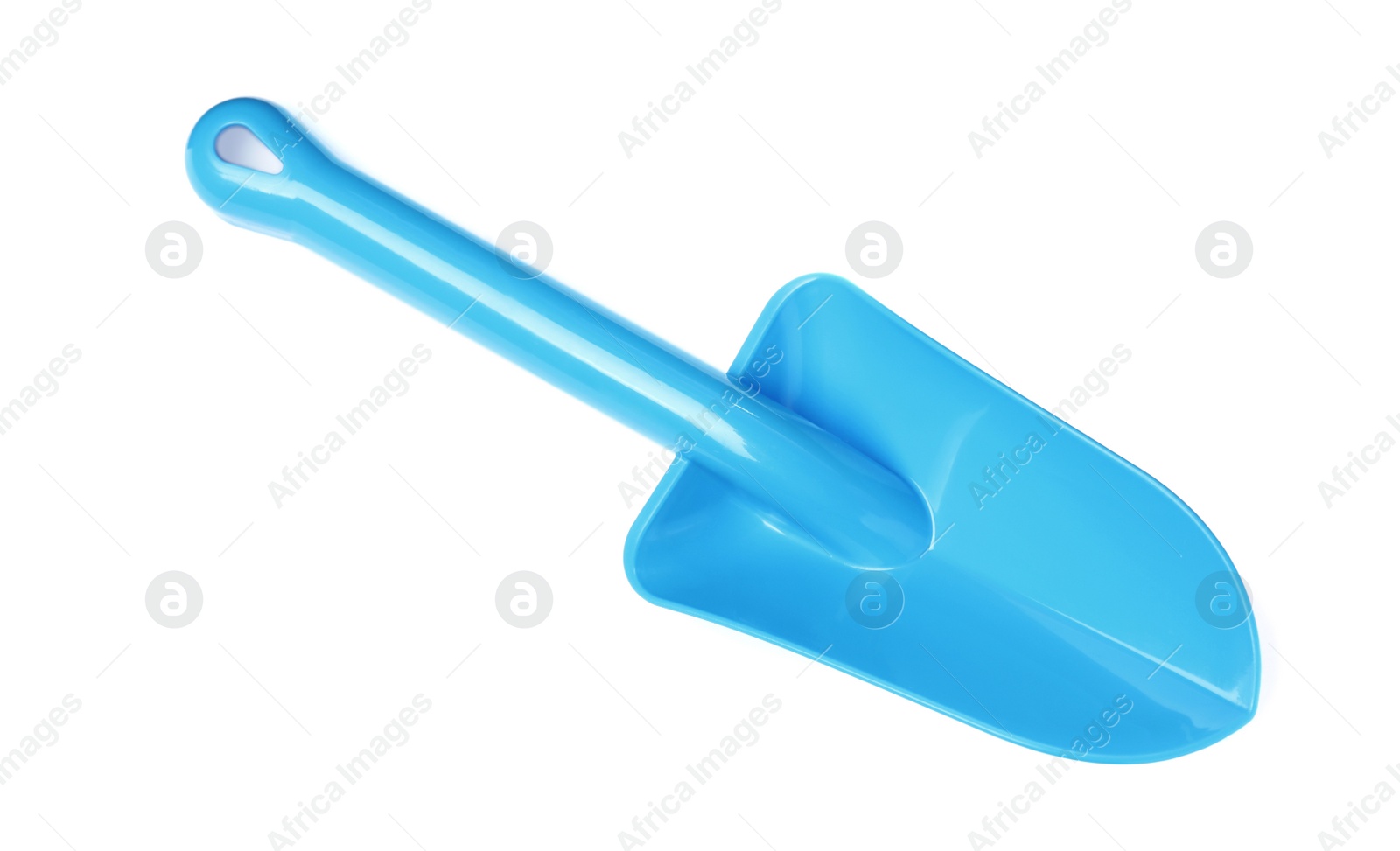 Photo of Light blue plastic toy shovel isolated on white, top view
