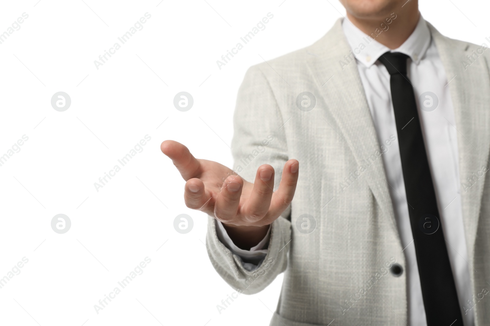 Photo of Businessman holding something on white background, closeup