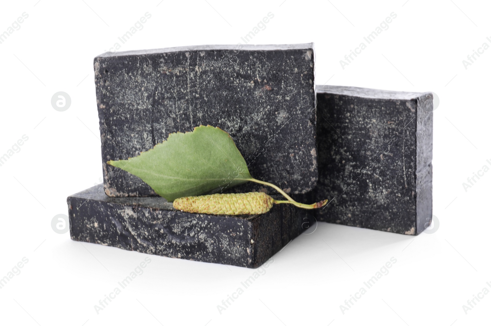 Photo of Tar soap bars isolated on white. Natural product