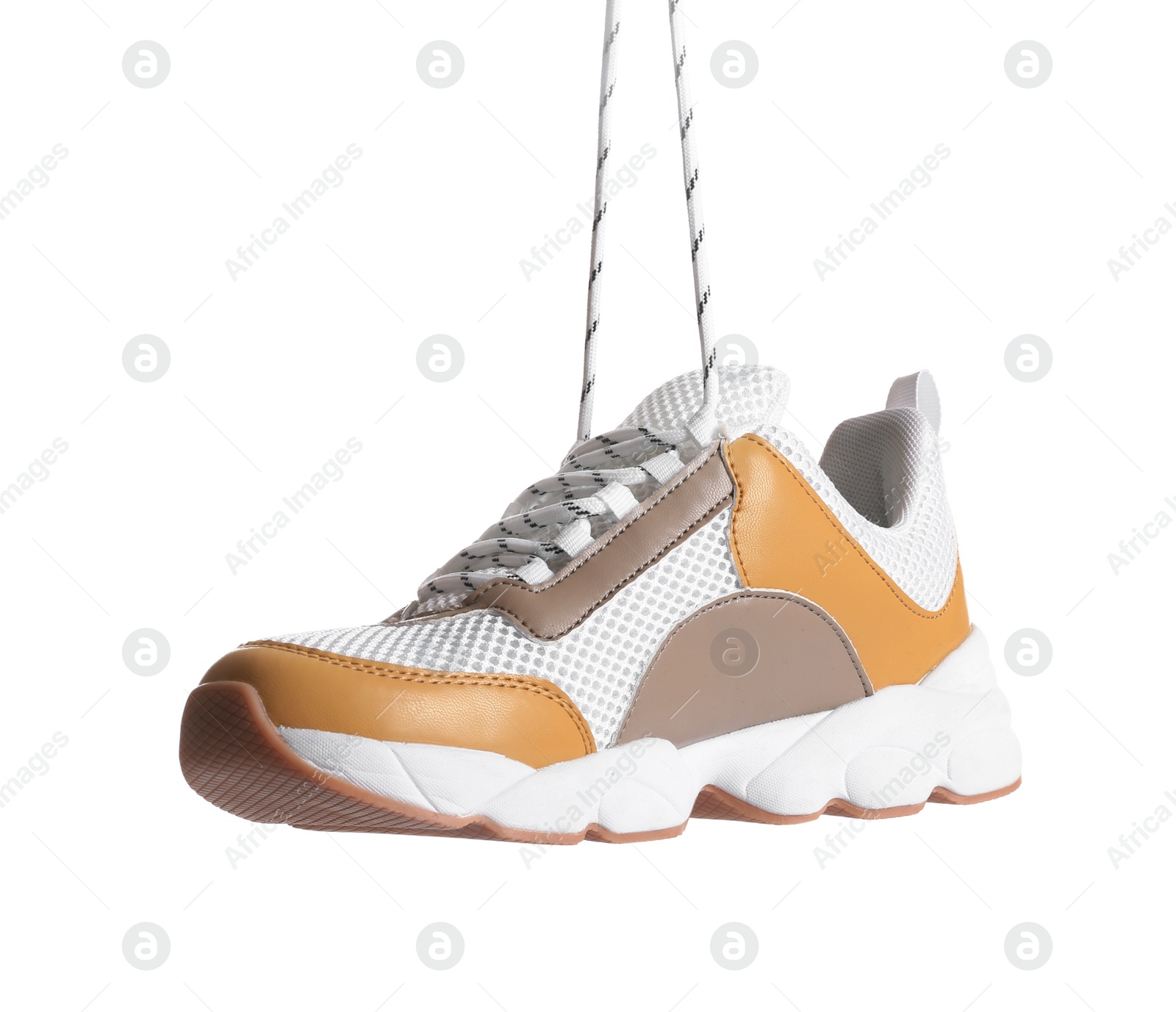 Photo of Comfortable modern sports shoe on white background